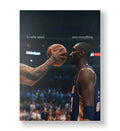 Kobe Bryant staring intensely at a basketball with 