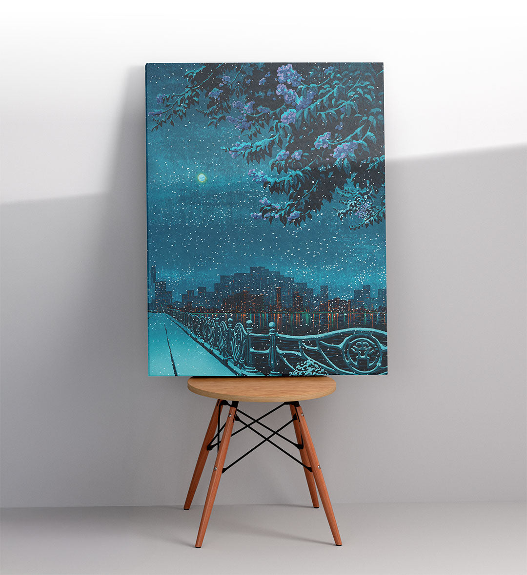 Aesthetic cafe wall display with peaceful night view art.