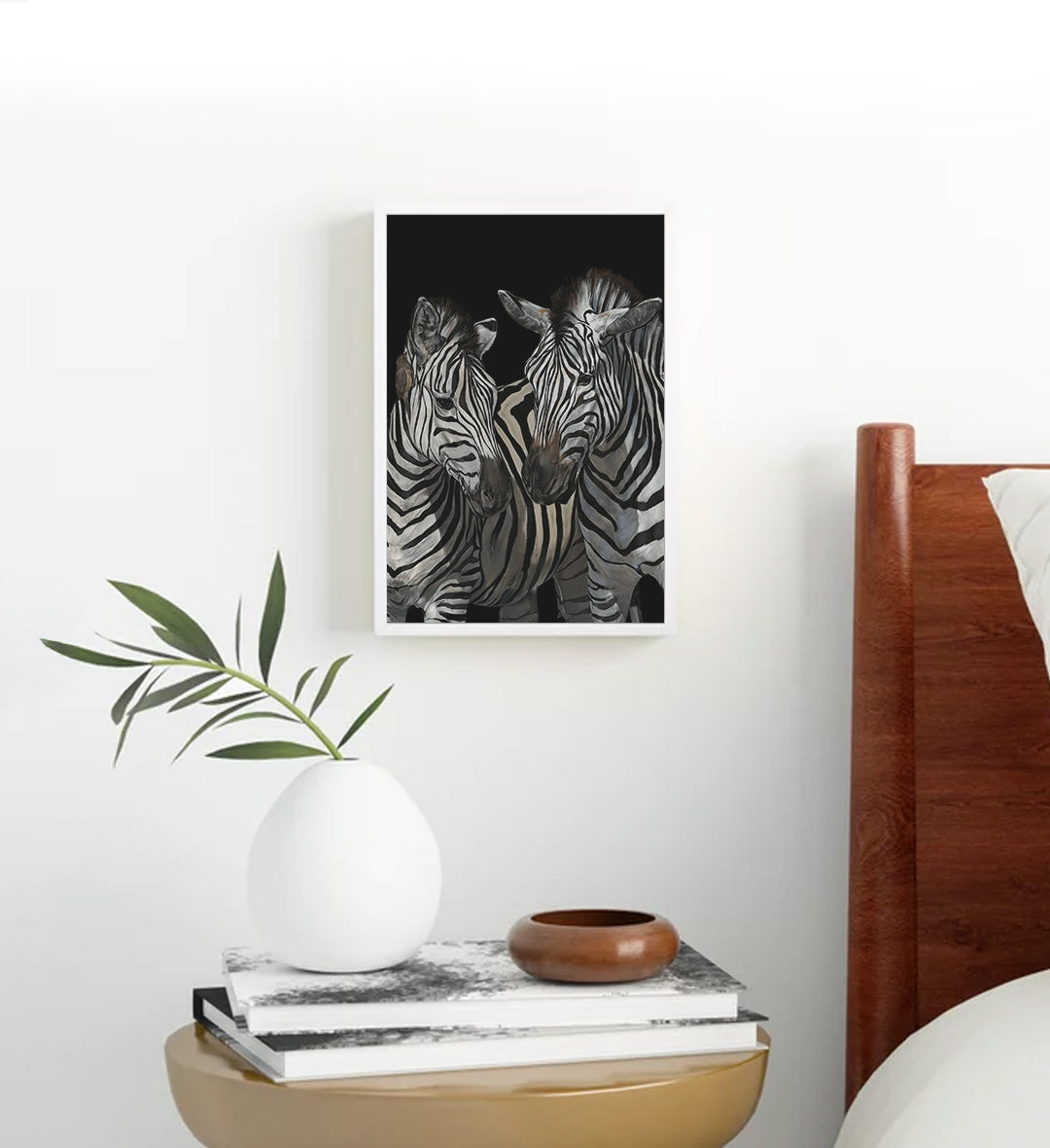 Minimalist bedroom styled with monochrome zebra canvas print.