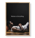 Detail of Kobe's contemplative expression and the texture of the orange basketball.