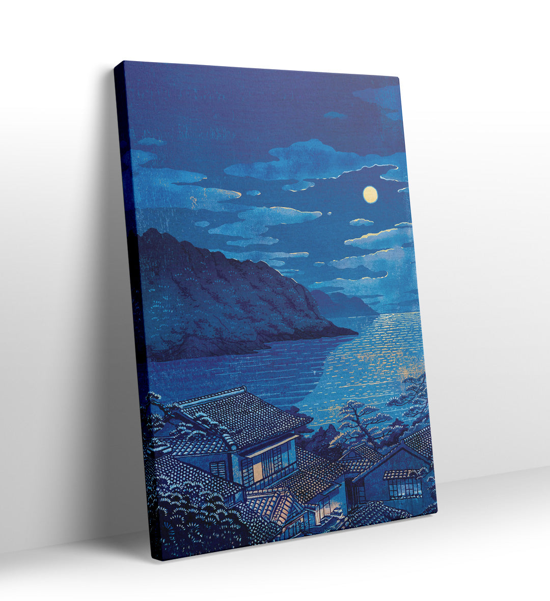 Traditional Japanese village rooftops overlooking a moonlit ocean canvas wall art.