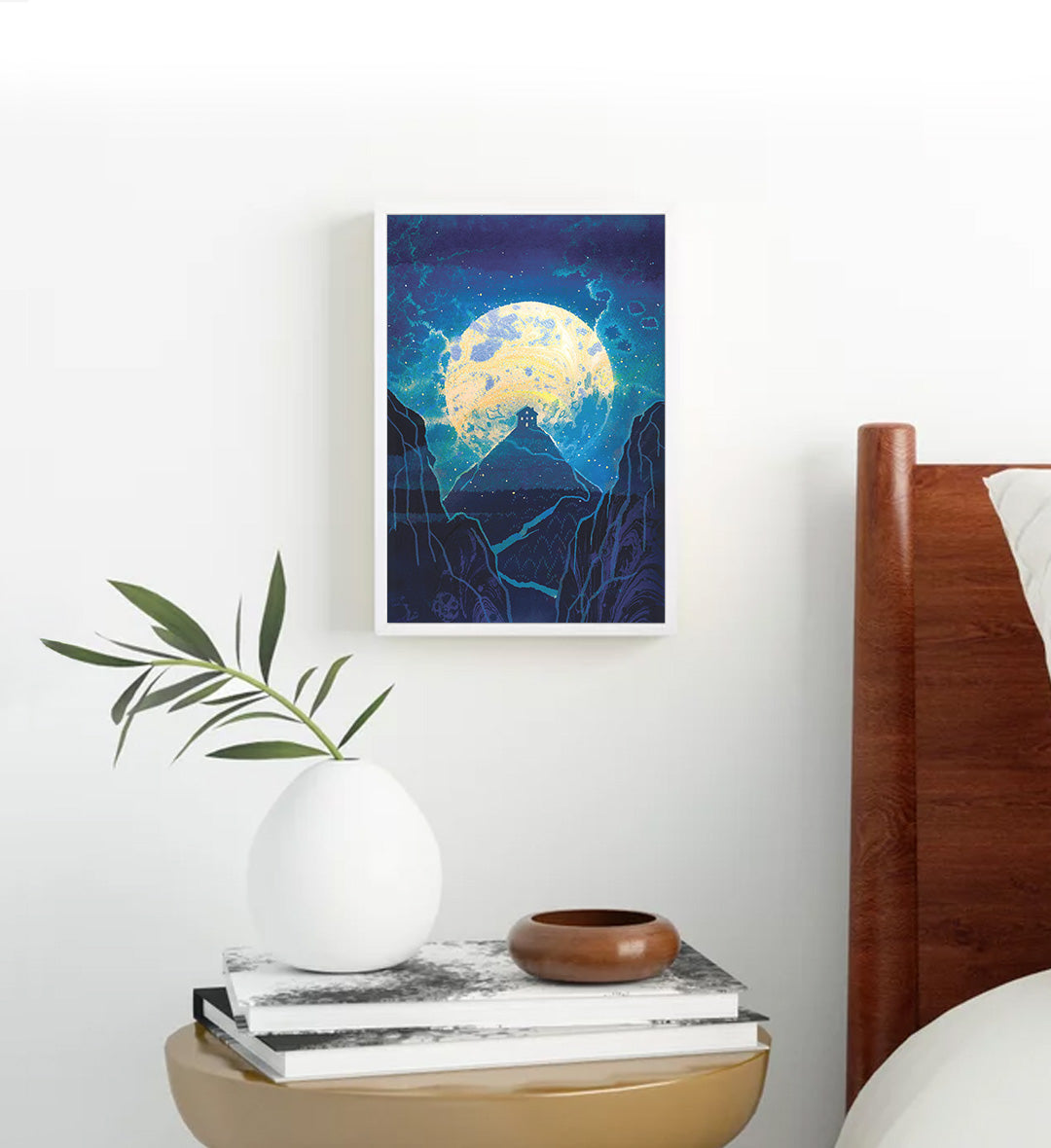 Minimalist living room featuring surreal night sky canvas print.