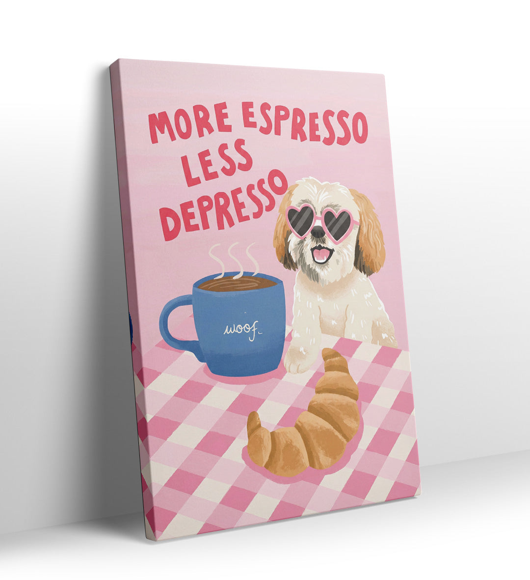 Detail of the fluffy dog's face, the croissant, and the blue mug that says "woof".