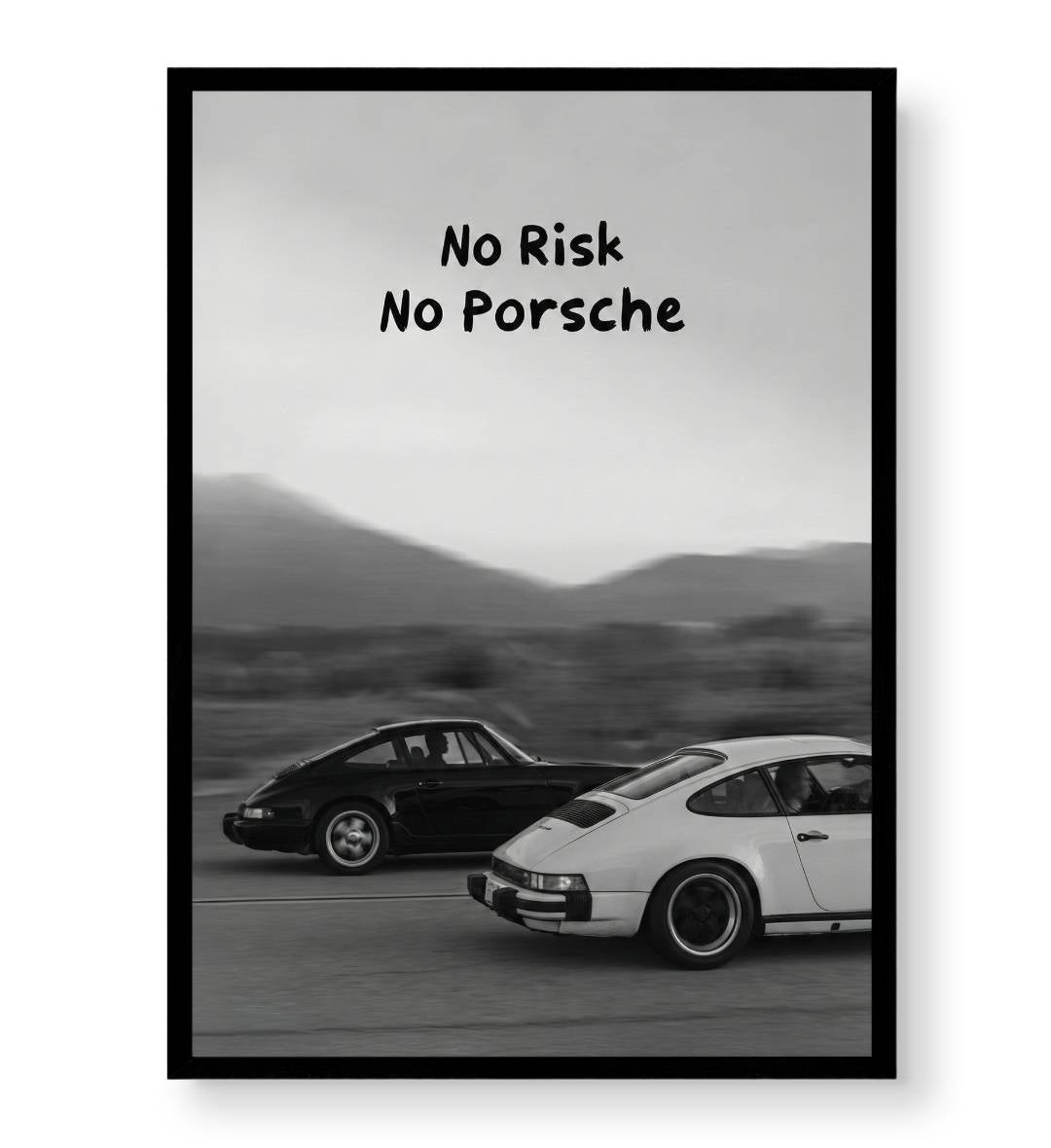 Entrepreneur workspace with inspirational automotive quote wall hanging.