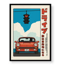Creative studio space with vintage travel poster wall hanging.