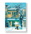 Vendor sitting under umbrella on a snowy street with yellow building canvas wall art.