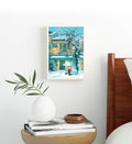 Minimalist bedroom styled with warm yellow and blue scenery canvas print.