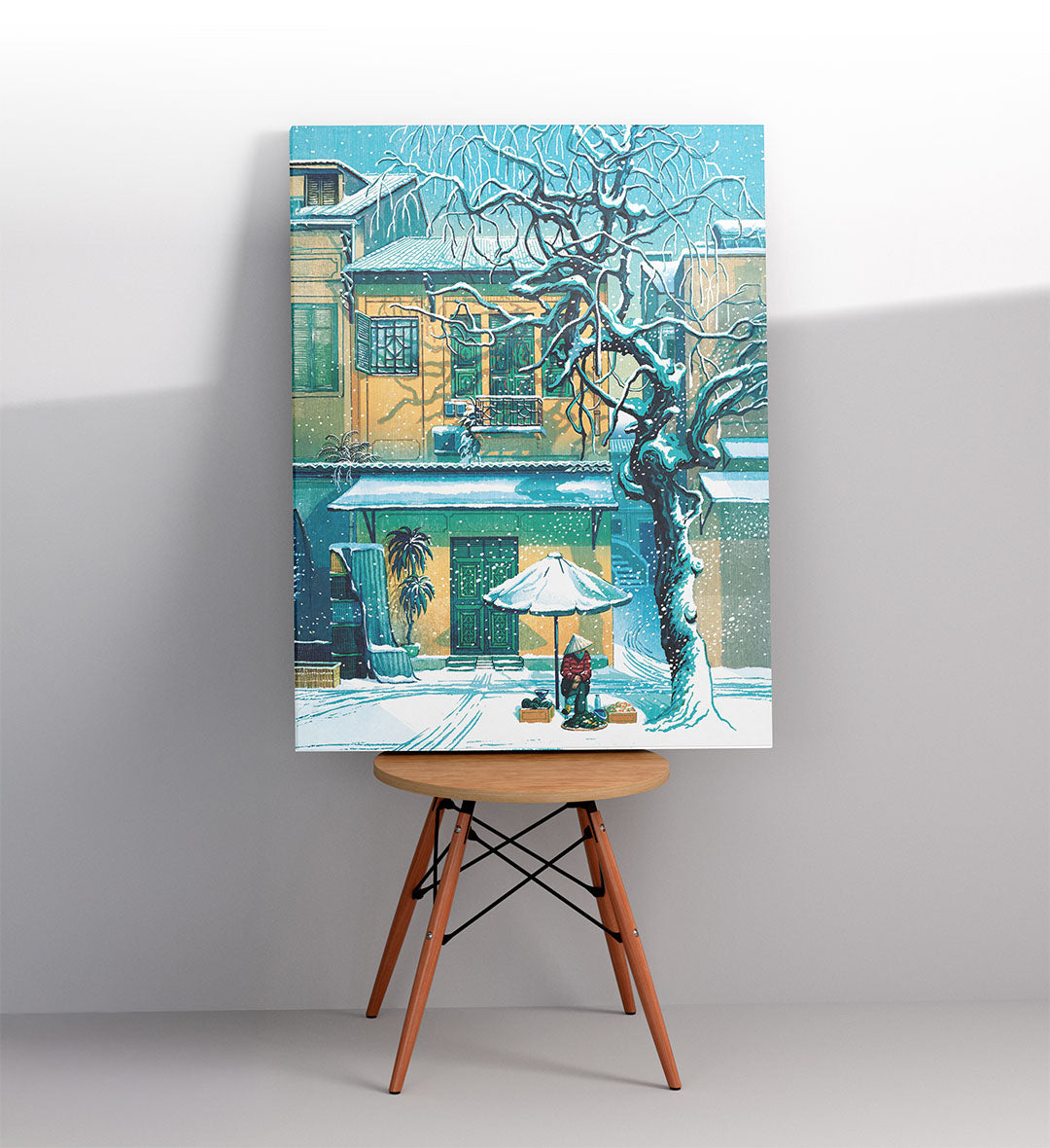 Modern study space with nostalgic travel-inspired wall hanging.