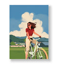 Woman riding a bicycle in a green field with fluffy clouds canvas wall art.
