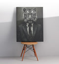 Detail shot of intense tiger eyes and textured fur on a business suit canvas