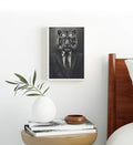 Edgy bachelor pad living room featuring monochrome anthropomorphic animal art.