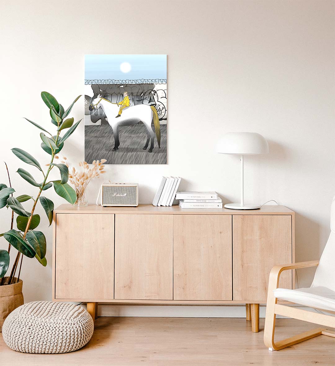 Creative office space with viral pop culture wall hanging.