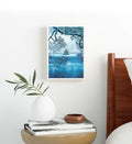Minimalist living room styled with blue and white scenery canvas print.
